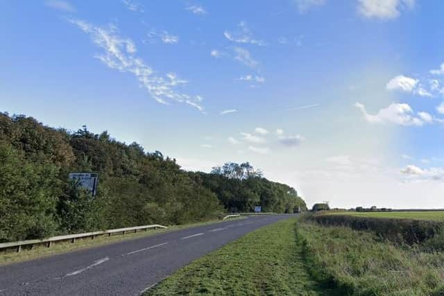 A driver died after a Land Rover crashed into a stationary car and and a tree