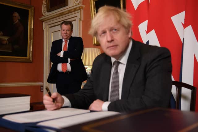 This was Boris Johnson signing his Brexit deal with the EU a year ago.