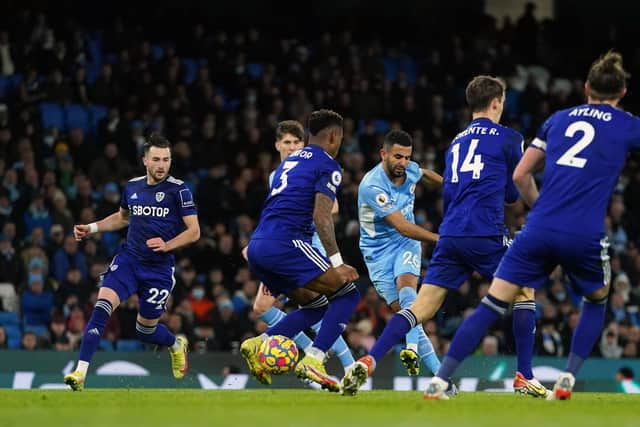 Manchester City's Riyad Mahrez (third right) scores their side's fourth goal. Picture: PA
