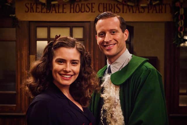 Helen (Rachel Shenton) and James (Nicholas Ralph) at the Skeldale House Christmas Eve party (note the green Santa suit).