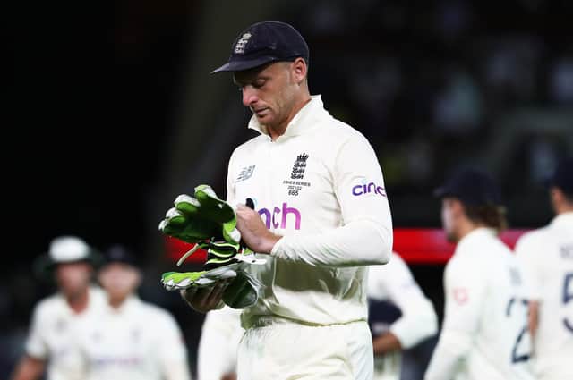 England's Jos Buttler reacts at the close of play during day one of the second Ashes test at the Adelaide Oval, Adelaide (Picture: Jason O'Brien/PA Wire)