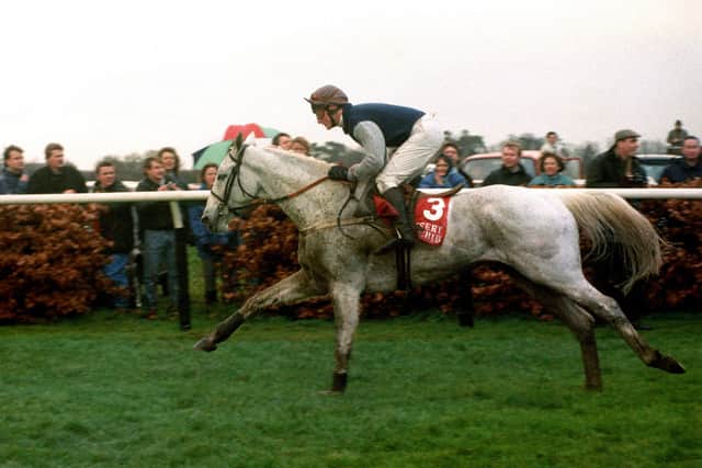File photo dated 26-12-1990 of Desert Orchid ridden by Richard Dunwoody, on his way to his then record fourth victory in the King George VI Rank Steeplechase at Kempton Park.