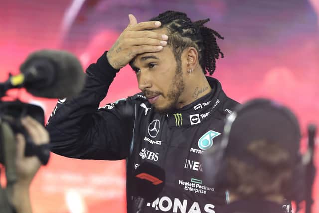Mercedes driver Lewis Hamilton of Britain reacts after finishing second in the Formula One Abu Dhabi Grand Prix in Abu Dhabi. (AP Photo/Kamran Jebreili, Pool)