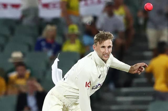 England's Joe Root bowls during day one of the second Ashes test at the Adelaide Oval, Adelaide..