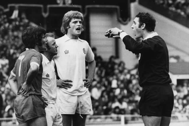 Bust-up: Gordon McQueen watches as referee R Matthenson sends off Kevin Keegan and Billy Bremner  for trading punches during a testy 1974 Charity Shield match at Wembley.  Picture: Getty Images