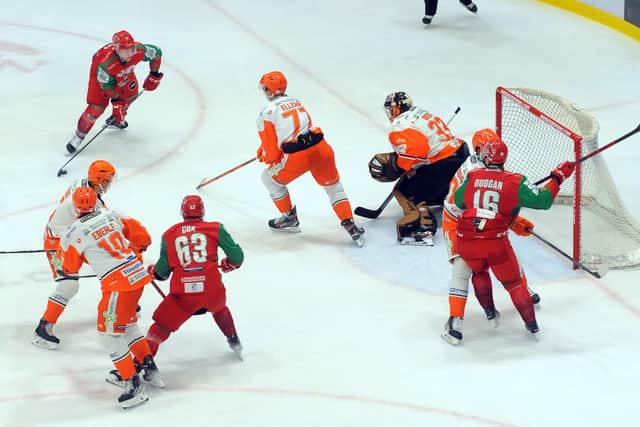 Cardiff Devils try to find a way through the Sheffield Steelers defence at Ice Arena Wales on Saturday night. Picture: Dave Williams/EIHL.