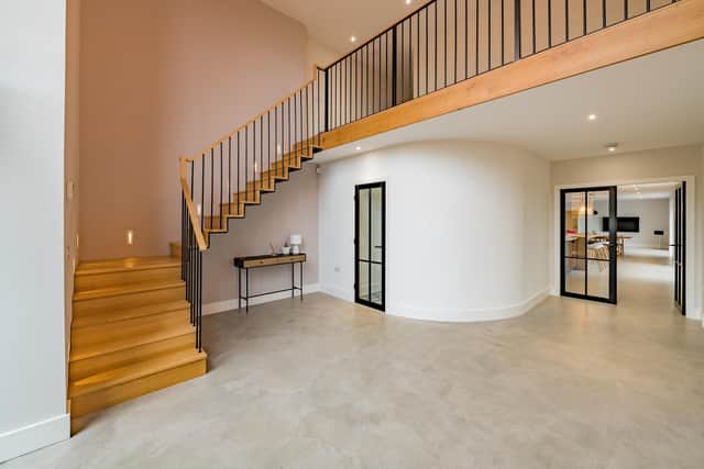 The contemporary stairs designed by the home owners