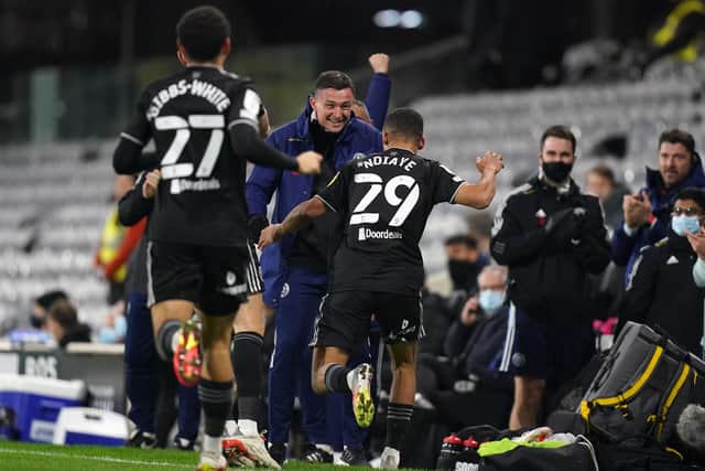 Sheffield United's Iliman Ndiaye celebrates with manager Paul heckingbottom after scoring what proved to his side's winning goal against Fulham at Craven Cottage. Picture: Adam Davy/PA