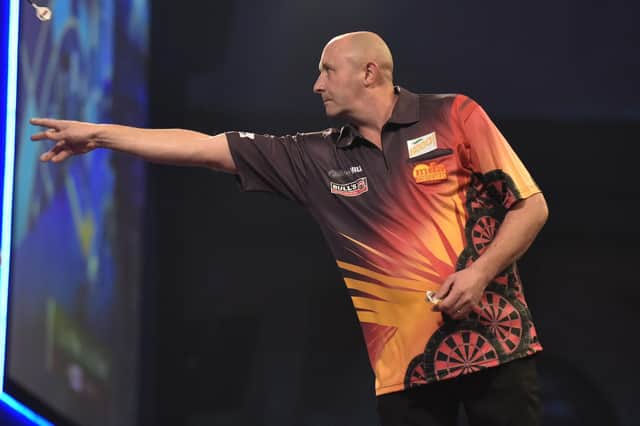 James Wilson in World Championship action against Luke Woodhouse. Picture by Chris Dean/PDC.