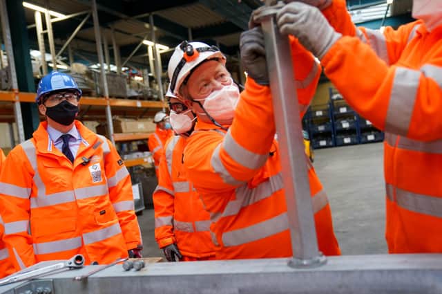 Transport Secretary Grant Shapps (centre) during a visit to the Leicester hub of Network Rail contractors SPL to see wiring gantries being built for the Midland Mainline electrification as he turns on his political - and media- critics.