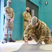 Soldiers building a Covid vaccine centre last year - but should they be more deployed more frequently by Ministers?
