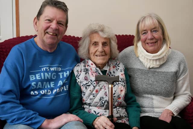 Olive with friends and carers Roger and Joan Dale