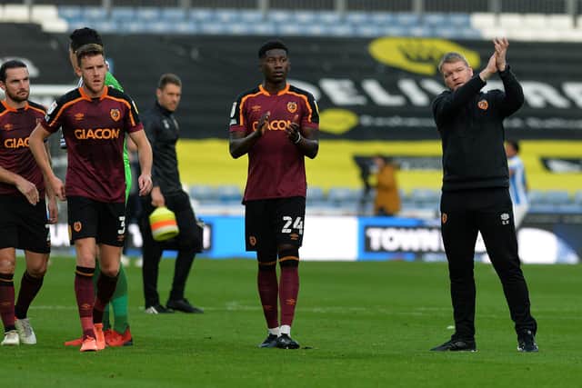 ISOLATING: Grant McCann (far right) will miss the Boxing Day match at home to Blackburn Rovers