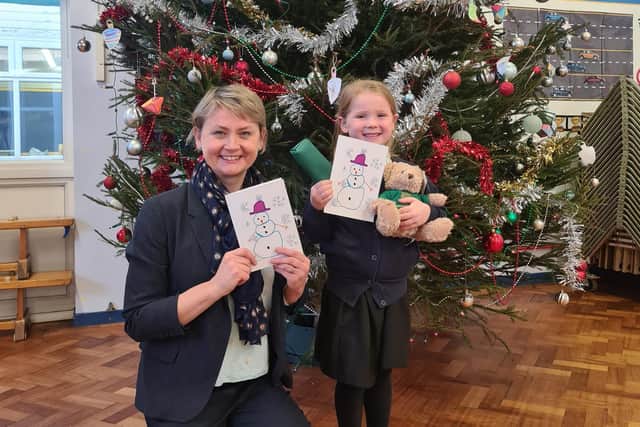 Yvette Cooper with the winner of her Christmas card competition.