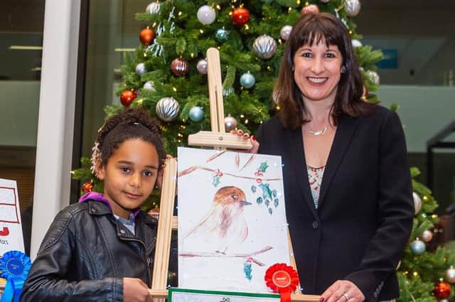 Rachel Reeves with her Christmas card design winner Maya. Picture: James Hardisty