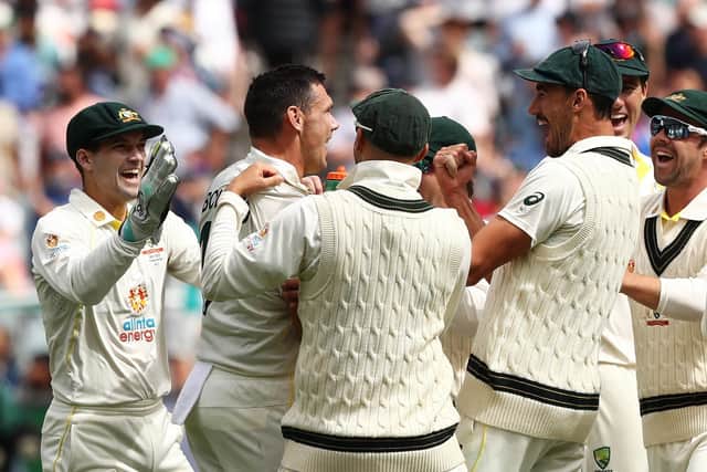 Joy: Australia's Scott Boland celebrates the wicket of England's  Mark Wood.