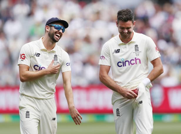 Got him: England's Mark Wood and James Anderson react after the wicket of  Australia's Marcus Harris.