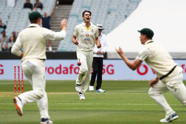 Australia's Pat Cummins celebrates the wicket of  England's Zak Crawley at Melbourne Picture: Jason O'Brien/PA