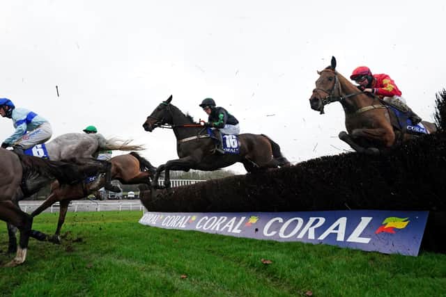 Iwilldoit ridden by Stan Sheppard (centre) coming home to win the Coral Welsh Grand National Handicap Chase during Coral Welsh Grand National Day at Chepstow Racecourse.
