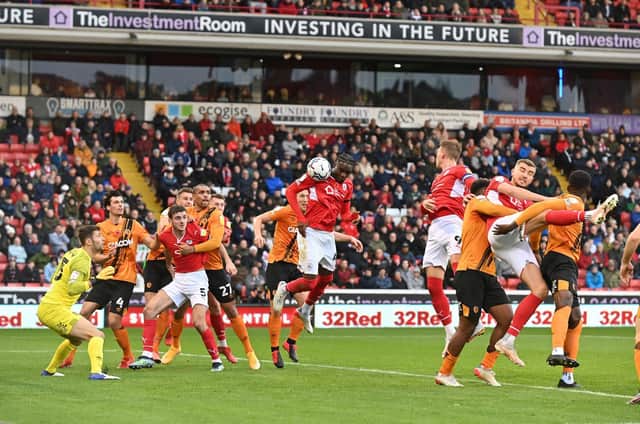 Barnsley defender Liam Kitching (third from left) pictured in action in the home game with Hull City in November. Picture: Bruce Rollinson.