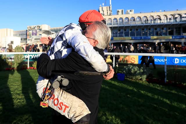 Davy Russell celebrates with owner Ronnie Bartlett after winning the Savills Chase onboard Galvin during day three of the Leopardstown Christmas Festival at Leopardstown Racecourse in Dublin, Ireland.