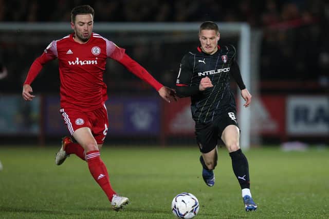 Accrington Stanley's Matt Butcher (left) and Rotherham United's Ben Wiles battle for the ball as the Millers' unbeaten run came to an end (Picture: PA)