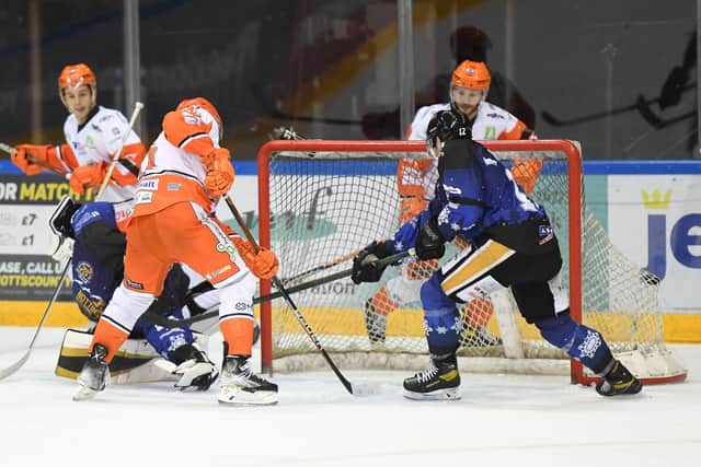 Tanner Eberle sweepes the puck into the Nottingham Panthers to give Sheffield Steelers a 3-0 lead at the Motorpoint Arena. Picture: Karl Denham/EIHL.