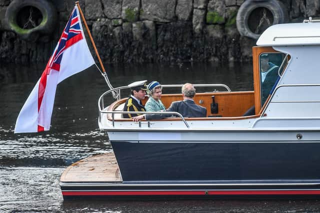 Imelda Staunton and other cast members are seen on a boat made to look like a Royal yacht tender in the harbour during filming for the Netflix series "The Crown" on August 2, 2021 in Macduff, Scotland. (Photo by Peter Summers/Getty Images)