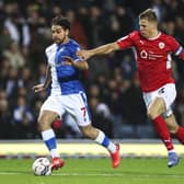Blackburn Rovers' Reda Khadra (left) and Barnsley's Mads Andersen (right) battle for the ball during the Sky Bet Championship match at Ewood Park on Wednesday (Picture: PA)