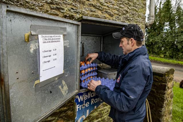 Paul Johnson stocking his free-range egg collection point