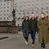 Having a ball: Sandra Patel-Stewart, Mike Quate and Elly Nettleton outside the Queens.