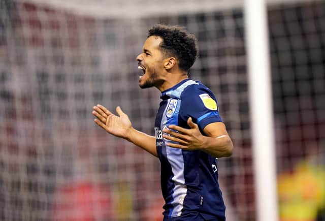 Matchwinner: Huddersfield Town goalscorer Duane Holmes celebrates at the end of the 1-0 win over Forest. Picture: Tim Goode/PA Wire.