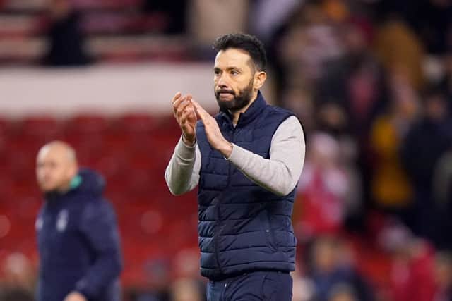 Proud: Huddersfield Town manager Carlos Corberan applauds the fans. Picture: Tim Goode/PA Wire.