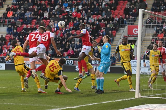 Michael Smith heads in Rotherham's opening goal from Shane Ferguson's cross. (Picture: Bruce Rollinson)