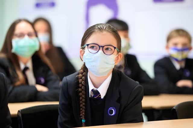 Children wearing facemasks during a lesson at Outwood Academy in Woodlands, Doncaster in Yorkshire in March 2021.