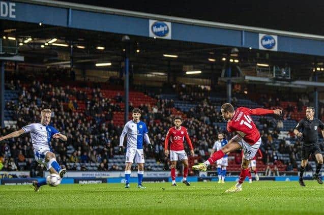 Barnsley FC's Carlton Morris, far right, fires home an equaliser on the stroke of half-time in the Reds' last game of 2021 at Blackburn Rovers. Picture: Tony Johnson