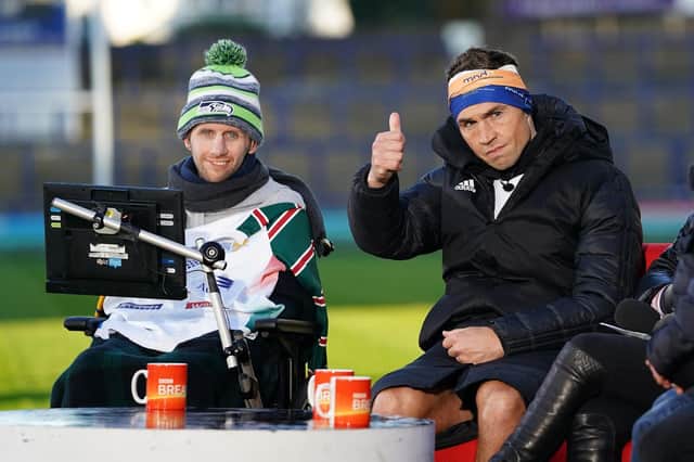 Kevin Sinfield, with Rob Burrow (left), is interviewed at Headingley Stadum after completing the Extra Mile Challenge from Leicester to Leeds on November 23, 2021. Picture: Zac Goodwin/PA Wire.