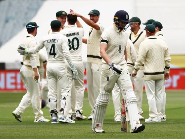 England's Zak Crawley walks off after being dismissed by Australia's Pat Cummins during day one of the third Ashes Test at Melbourne.