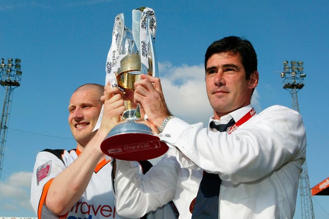 In his second season as manager and oversaw what was a superb year, Luton brushing all aside to win the League One title. Also led the club to 10th the following term, but left in March 2007 after a fall-out with the club's board.