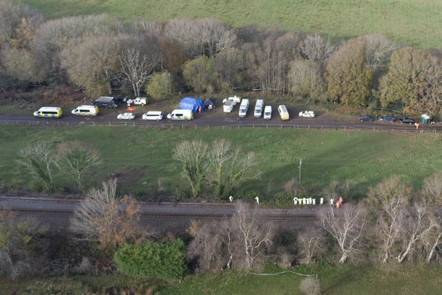 Dozens of officers are searching a rural area around Rock Lane, near Three Oaks, north of Hastings, for Alexandra Morgan's body. Police have been searching nearby woods and streams, and British Transport Police officers have been searching the nearby railway line.