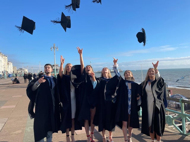 Seafront celebrations for University of Brighton students who have attended their graduation ceremony in Brighton