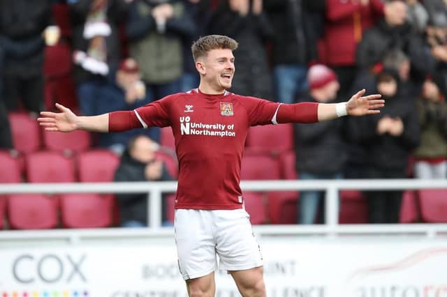Sam Hoskins celebrates after scoring a superb second goal. Pictures: Pete Norton.