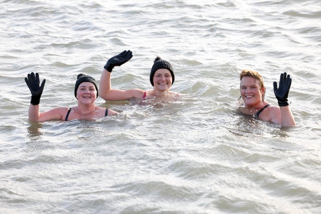 Braving the cold at the New Year's Day swim in Carnlough, Co. Antrim.  Picture: Stephen Davison / Pacemaker.