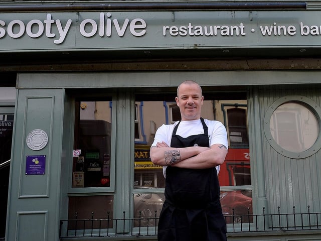 Sean Harrigan, Head Chef / Proprietor of the Sooty Olive pictured outside the restaurant in Spencer Road Photo: George Sweeney / Derry Journal. DER2120GS – 018