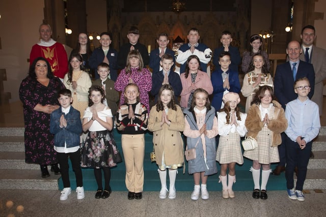 Children from Rosemount Primary School who received the Sacrament of Confirmation from Fr. Paul Farren at St. Eugene's Cathedral on Friday. Included in photo are Mr. Paul Bradley, Principal and teachers Miss Begley and Mr. Quinn. (Photo: Jim McCafferty Photography)