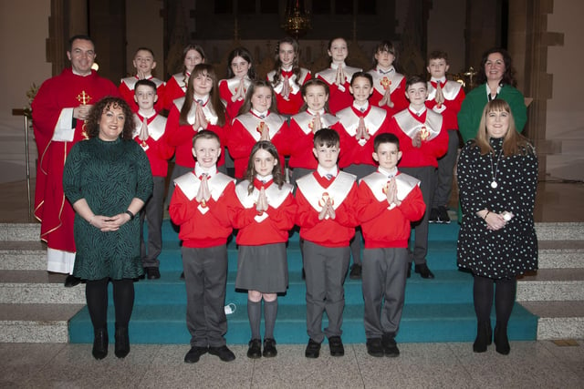 Children from St. Eugene's Primary School who received the Sacrament of Confirmation from Fr. Patrick Lagan at St. Eugene's Cathedral on Friday. Included in photo are Mrs. Carol Duffy, Principal, Ms. Cathy Faulkner and Ms. Amanda Carson. (Photo: Jim McCafferty Photography)