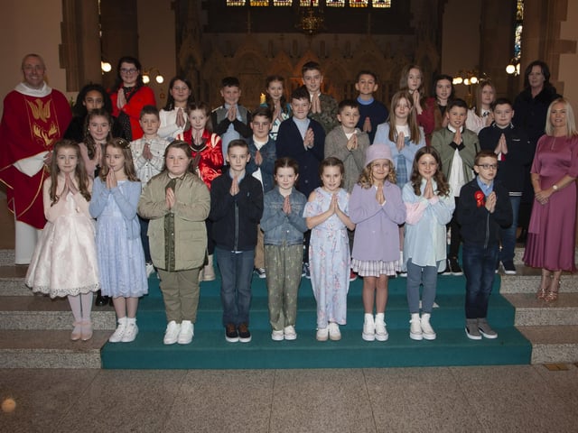 Children from St. Anne's Primary School who received the Sacrament of Confirmation from Fr. Paul Farren at St. Eugene's Cathedral on Thursday. Included in photo are Mrs. Eilis McGuinness, Principal and Mrs. Jennifer Morrison, class teacher. (Photo: Jim McCafferty Photography)