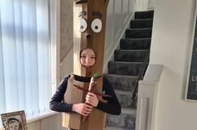 Caitlín as Stickwoman. Caitlín made this costume, with help from her daddy, out of recycled cardboard.