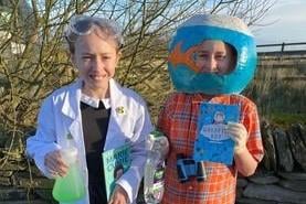 Scarlet, p6 and Edward, p7, as Marie Curie and Matthew fromThe Goldfish Boy.