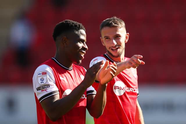 KEY MEN: Rotherham United's Chiedozie Ogbene (left) and Dan Barlaser Picture: Isaac Parkin/PA